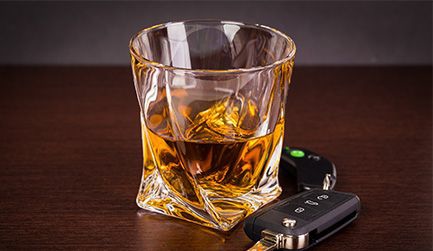alcoholic drink next to car keys